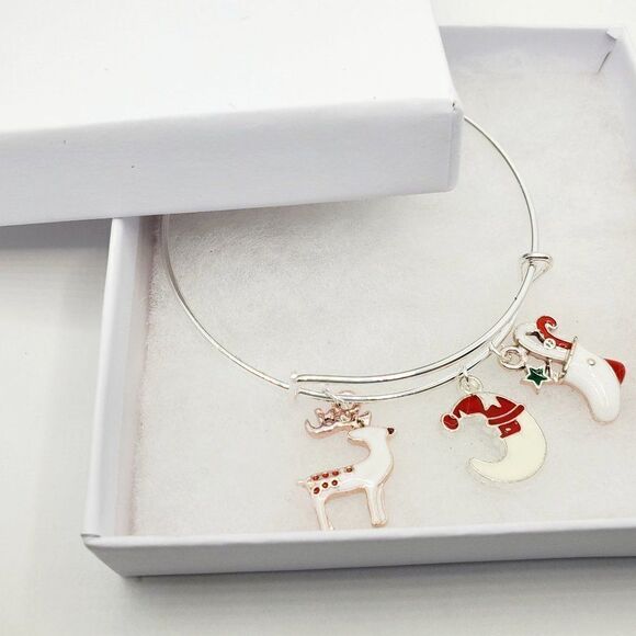 Christmas
Reindeer, Christmas Moon, and Christmas Stocking Charm Bracelet - Picture 1 of 12